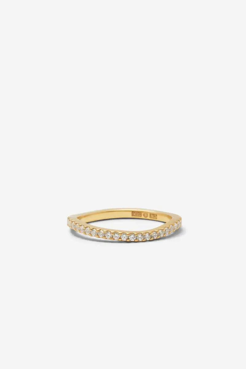 18-karat gold diamond eternity band ring.