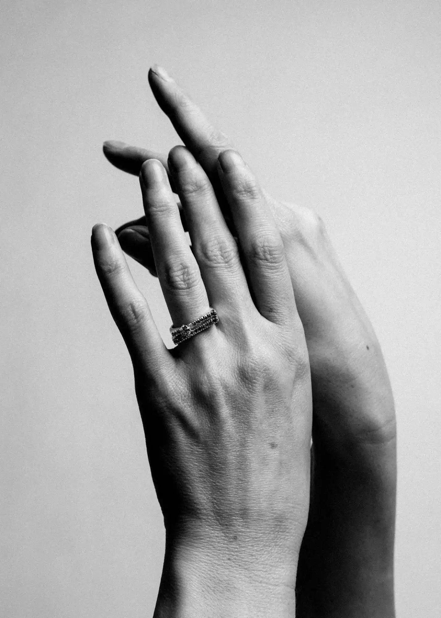 Elegant hands with a ring.