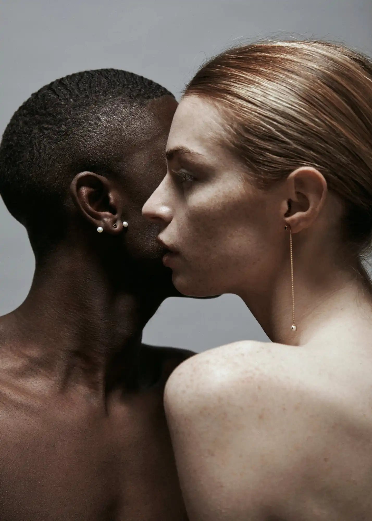 Interracial couple’s intimate portrait.