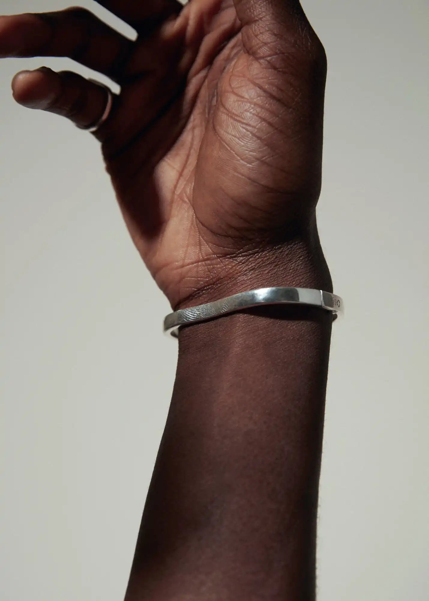 Silver cuff bracelet.