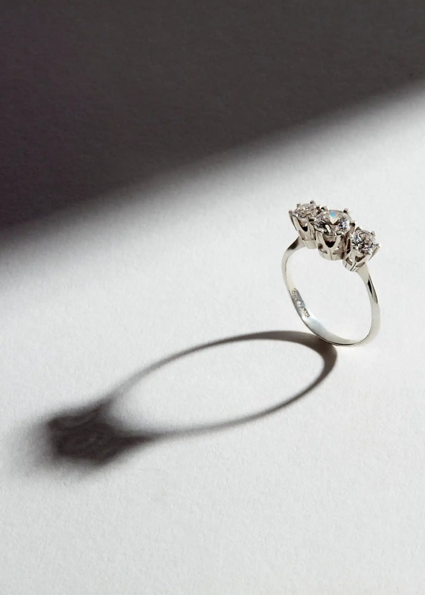 Three-stone diamond ring.