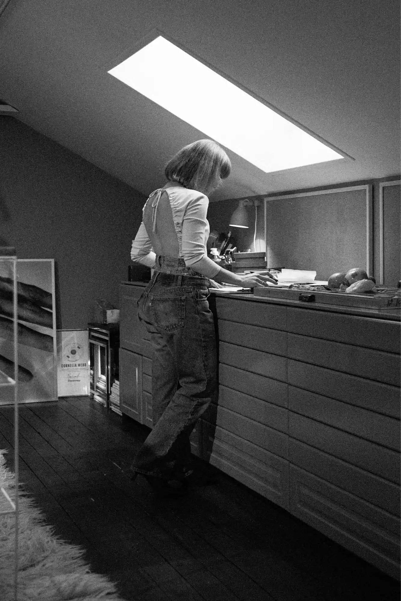 Woman at counter.